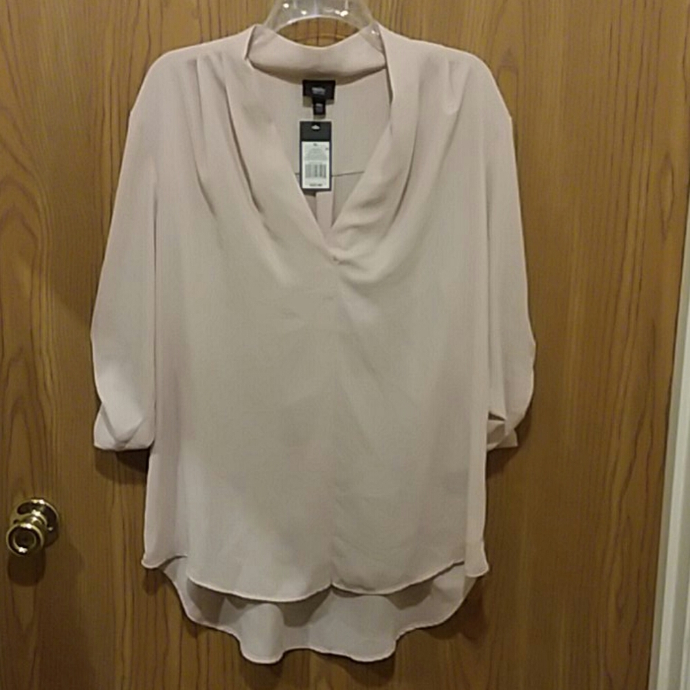 Beautiful light peach blouse. New